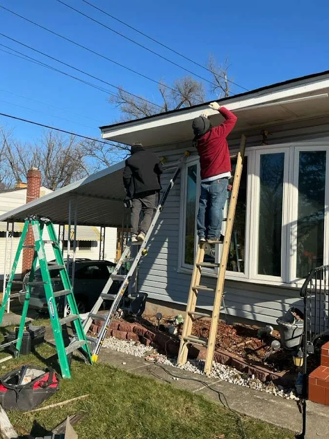 Restoration crew performing exterior repair in Rockcreek